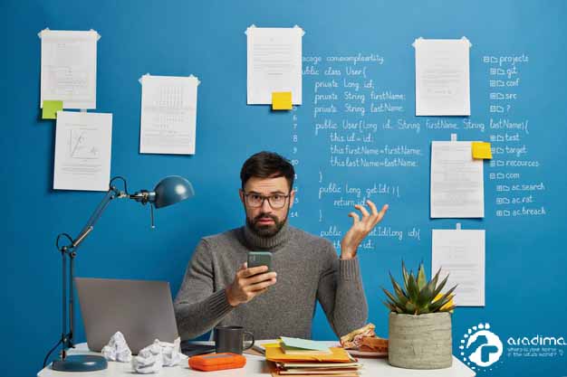 skilled-male-programmer-it-project-manager-tries-solve-problem-with-modern-technologies-keeps-hand-raised_273609-3445347