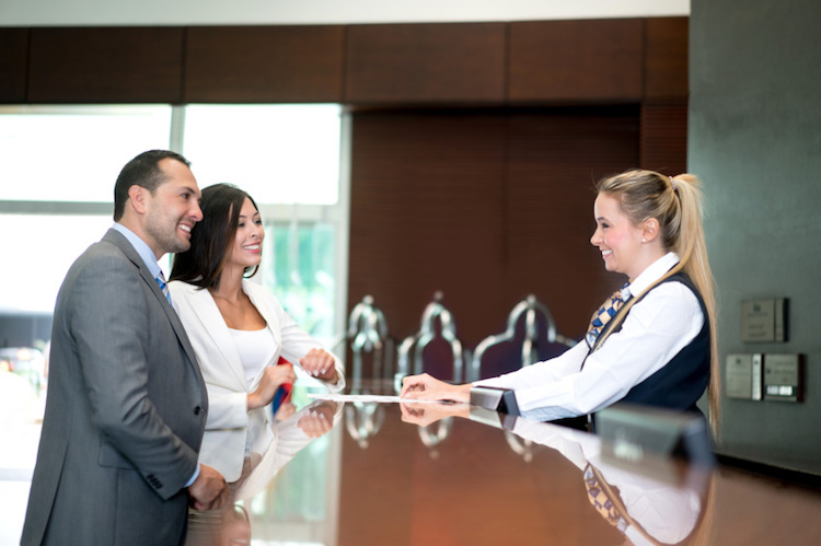 business-couple-doing-check-in-at-the-hotel-000085576877_small