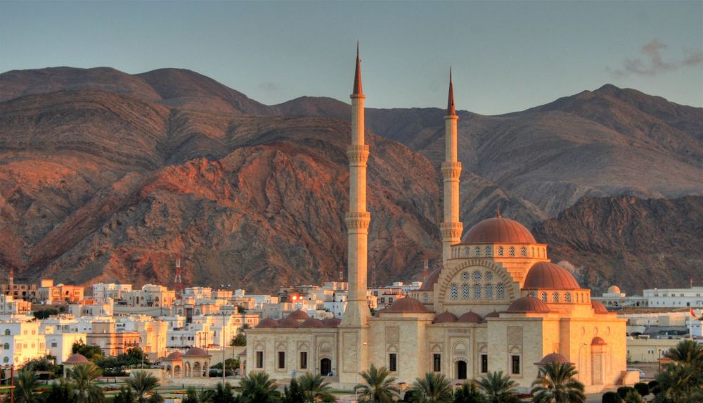 Grand-Mosque-and-mountains-Muscat-Oman
