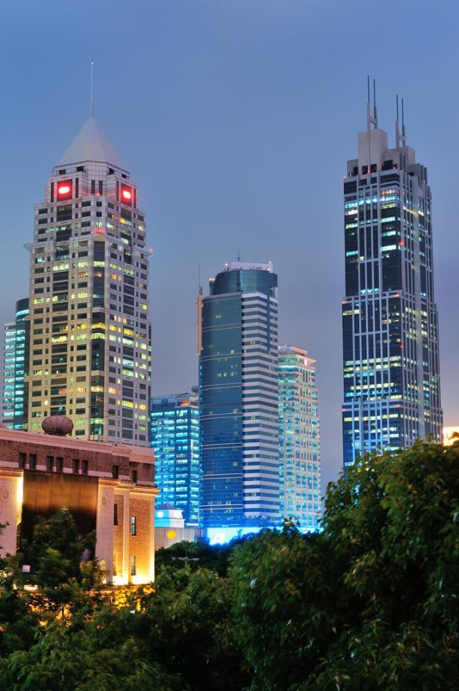 shanghai-night-with-urban-skyscrapers-lights_649448-4405