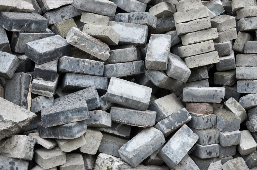 large-pile-disassembled-paving-slabs_76080-6509