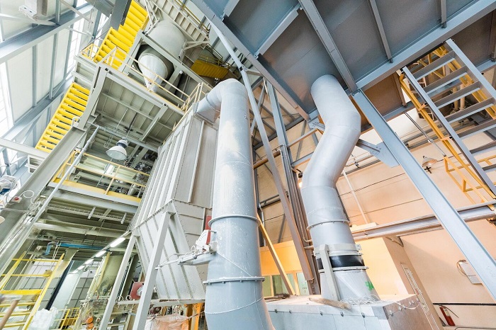down-up-view-modern-operational-plant-with-grey-pipes-ladders-heavy-industry-machinery-metalworking-workshop-concept_645730-419