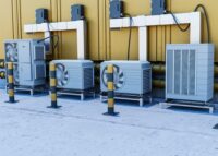 close-up-heat-pump-outside-home_23-2149250254